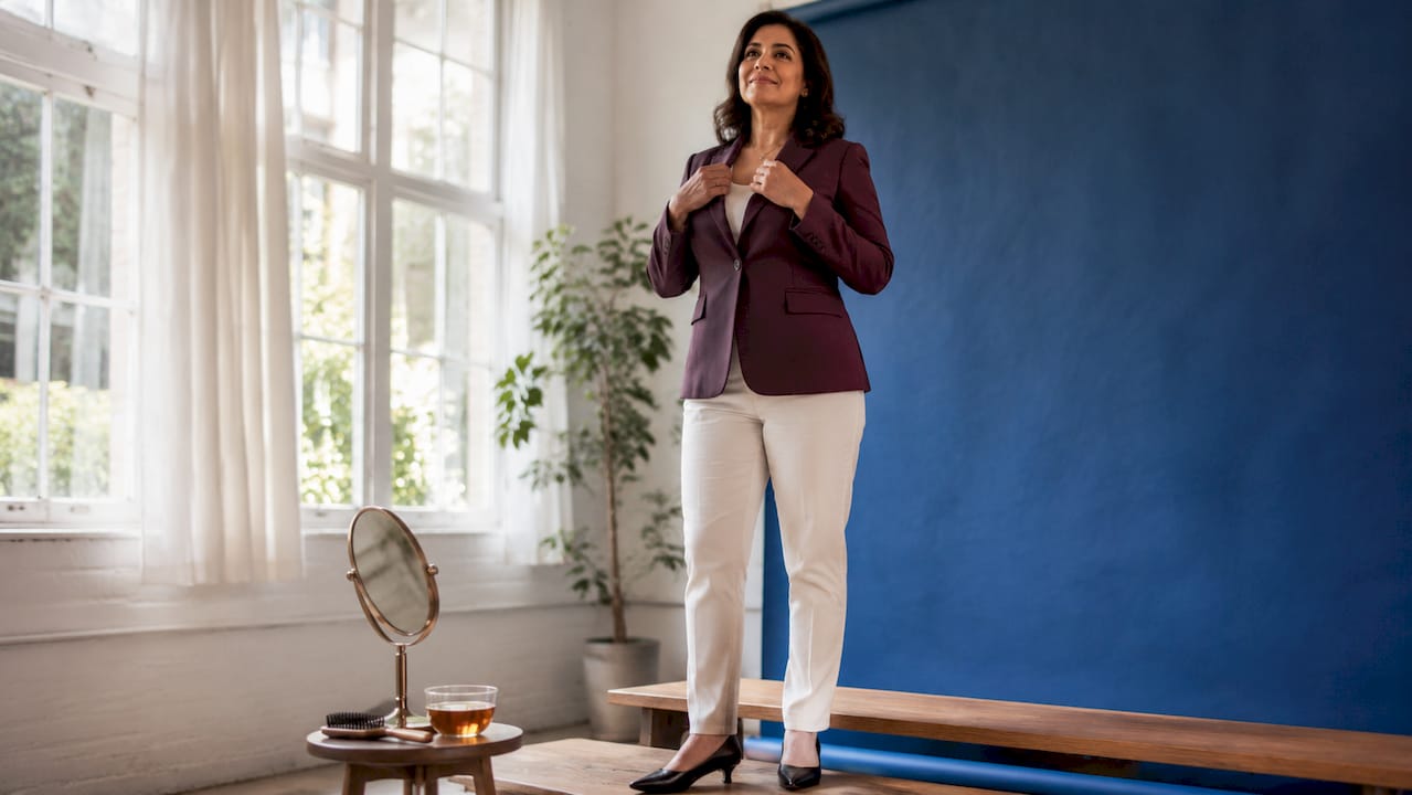 Woman preparing for professional headshot session