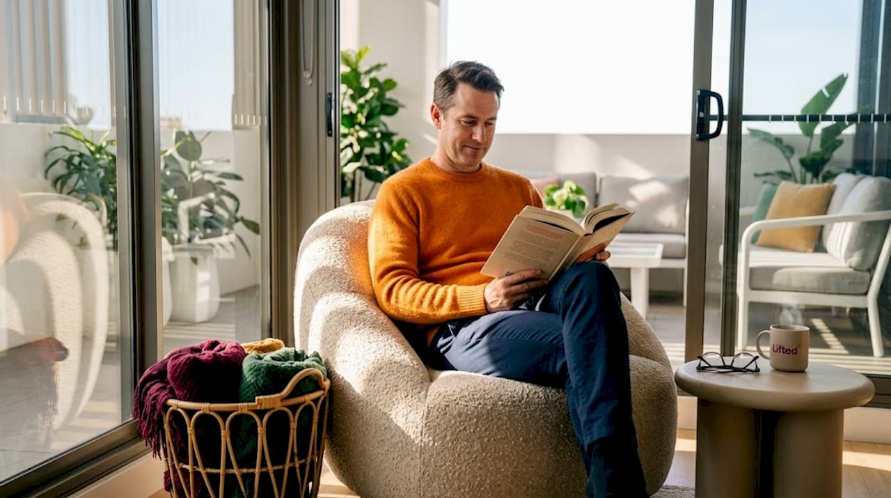 Sculptural form in furniture: Design impact and real tips 3 Person reading in rounded sculptural chair