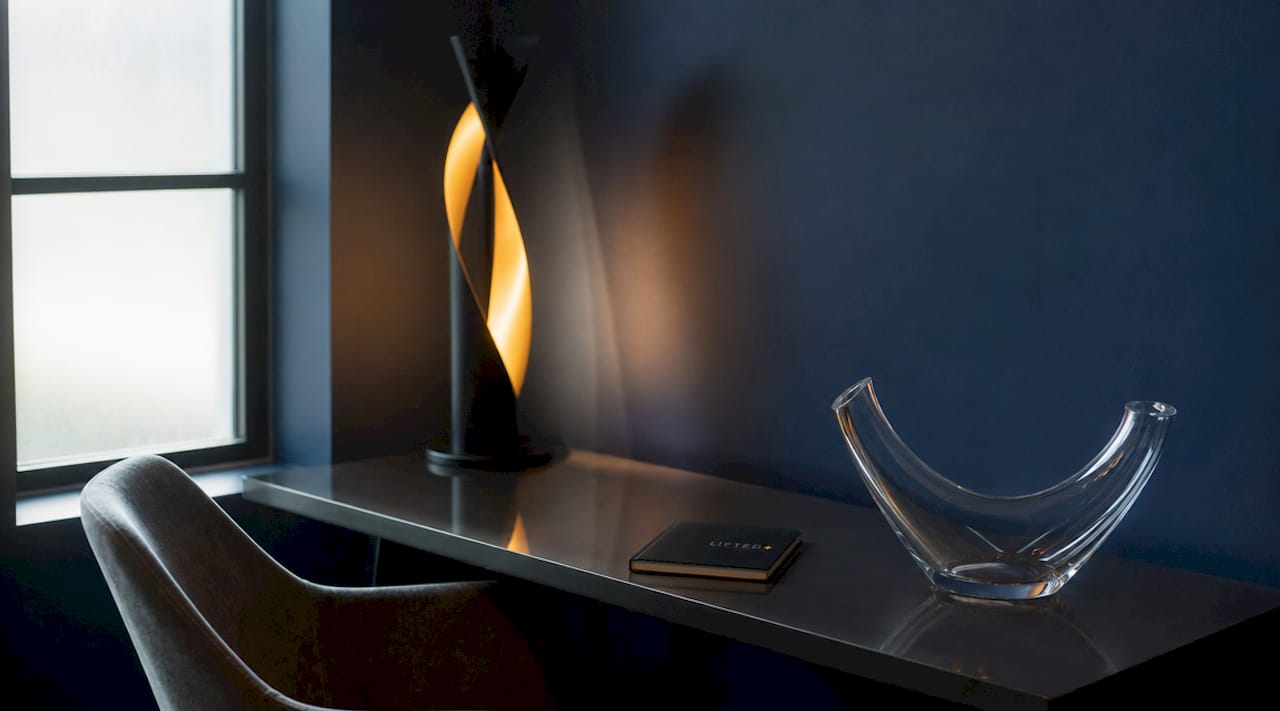 What is curated decor? A guide to intentional style 3 Sculptural lighting and negative space in curated room