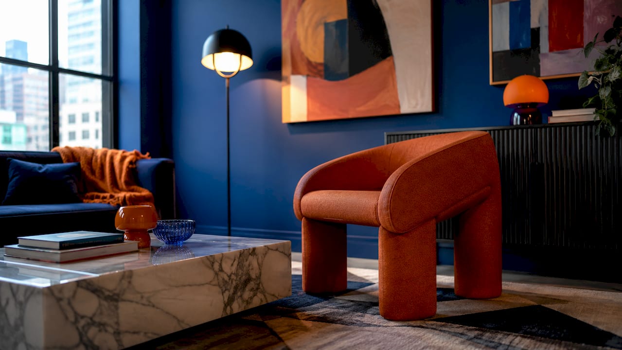 What is vibrant interior style: a bold design guide 3 Dining area with saturated hues and sculptural furniture