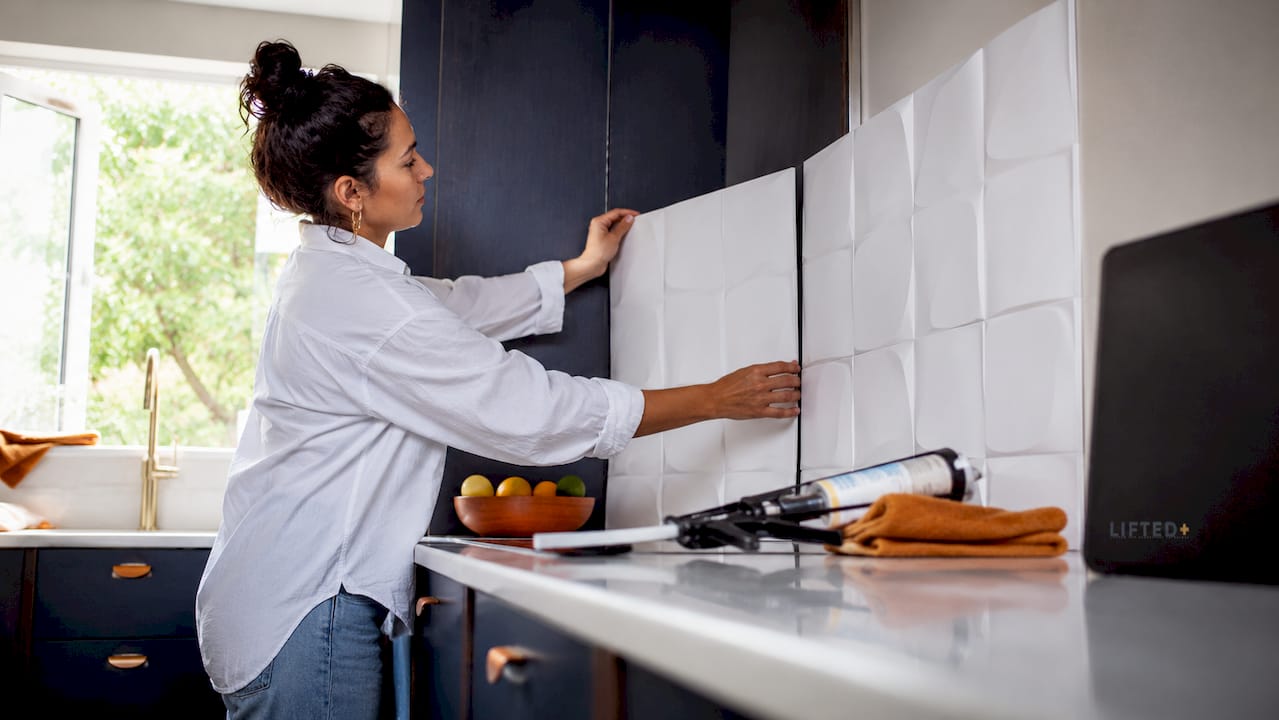Decorative wall panels: a homeowner's guide for 2026 3 Hands fitting moisture resistant PVC wall panels