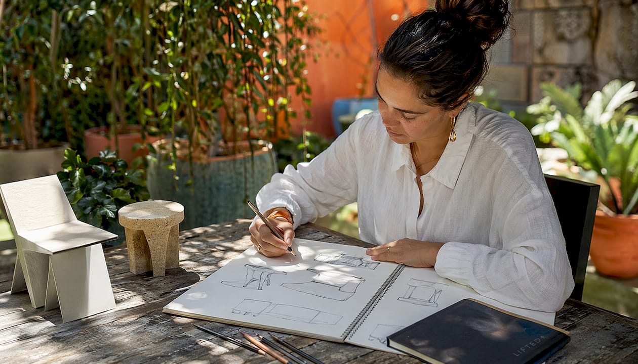 What is form focused furniture: a design guide 3 Designer sketching geometric and organic furniture forms