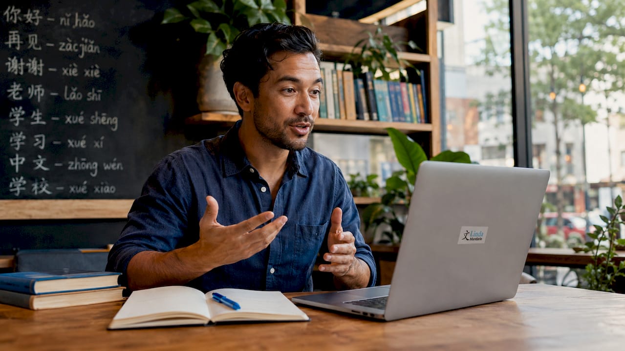 Language tutor conducting Mandarin lesson via video call