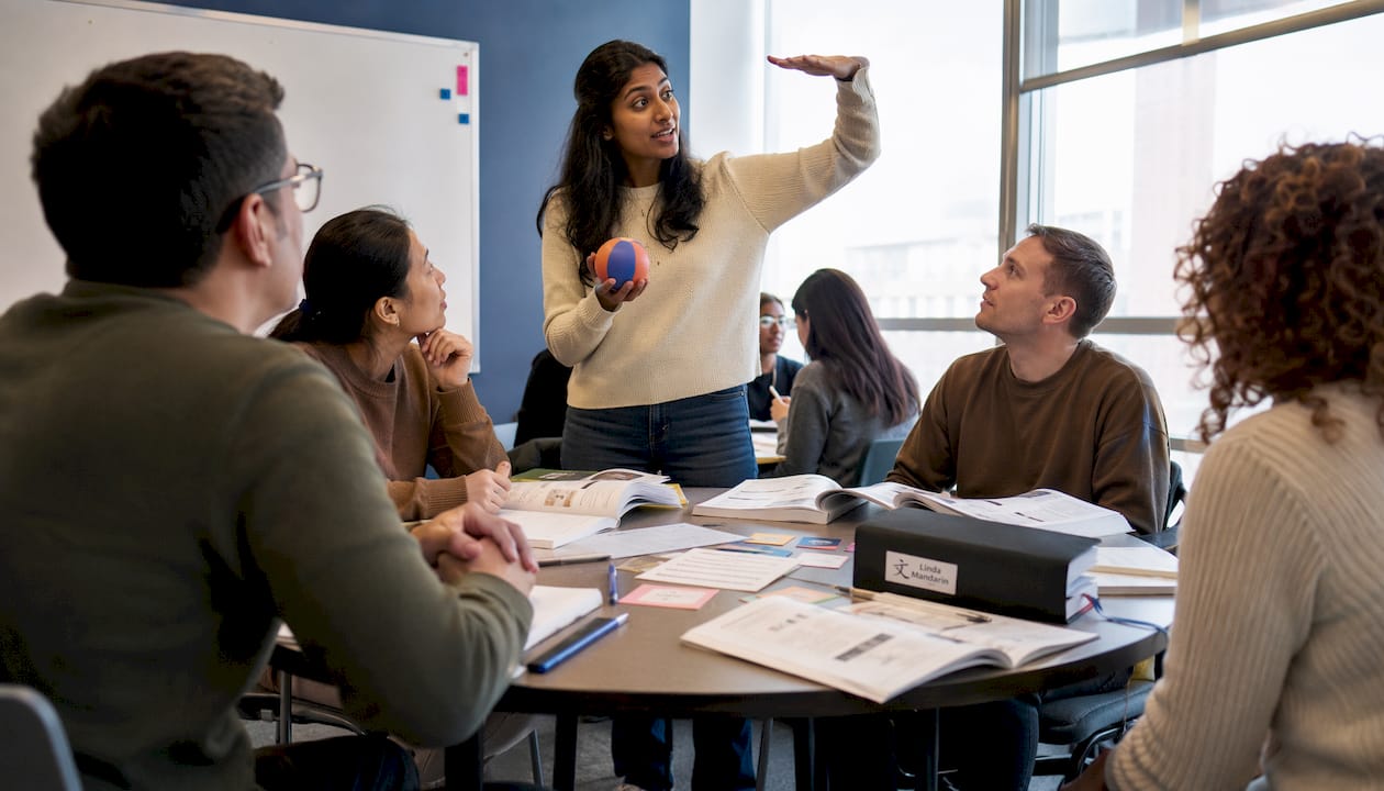 Teacher leading tone-pair drills in classroom