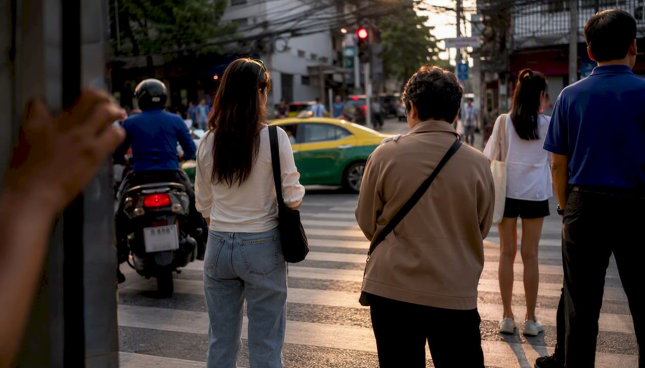 Crosswalk and traffic light in Thai city street