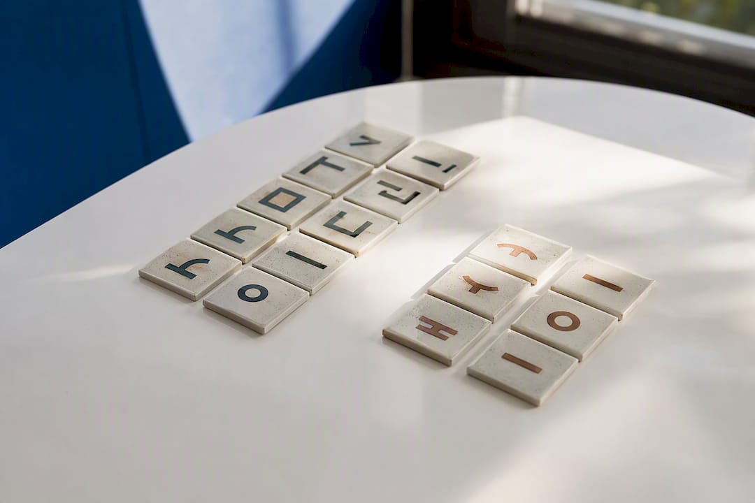 Wooden tiles with Hangul consonant and vowel shapes