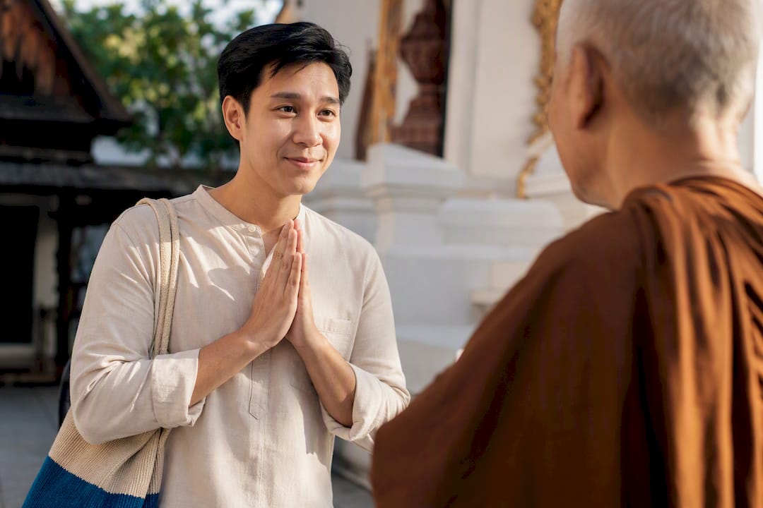 Thai wai greeting showing respectful posture