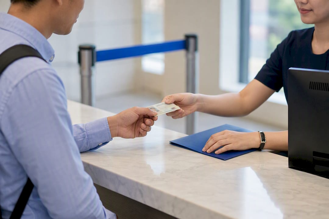 Candidate presenting ID at exam check-in