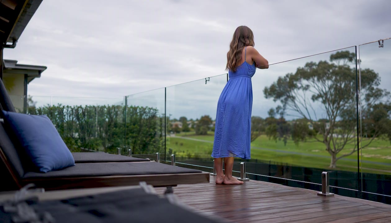 Frameless glass railing on residential deck