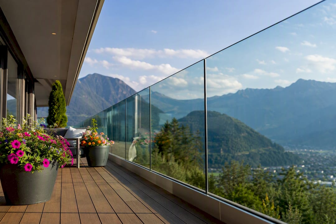 Modern residential balcony with glass railing