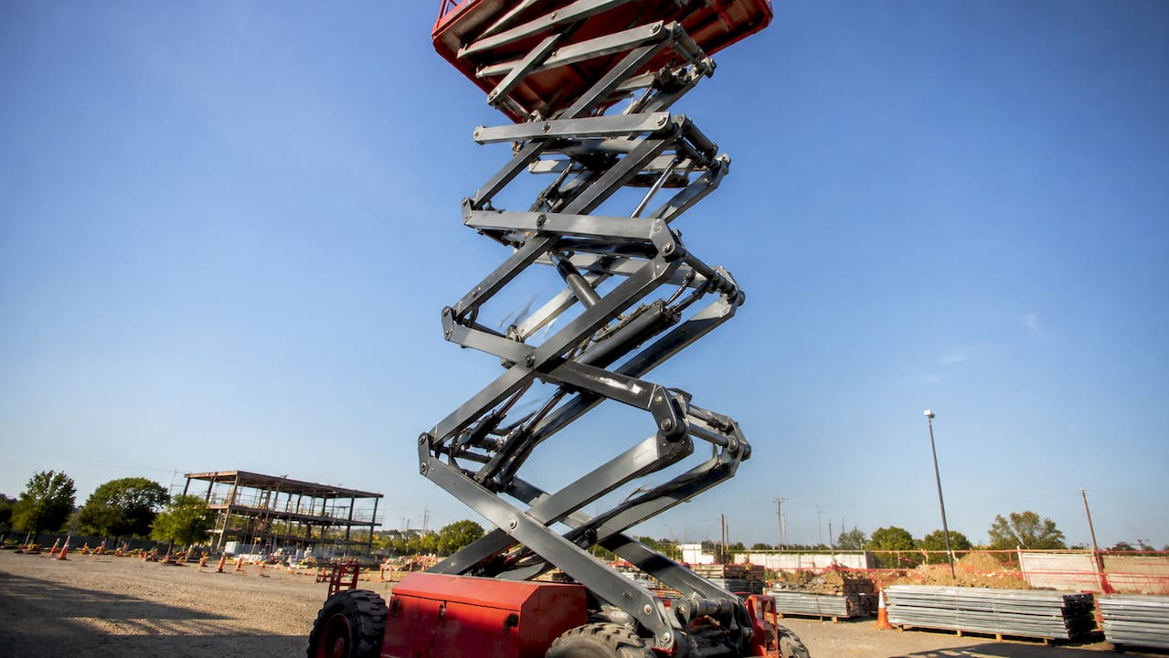 Close-up view of scissor lift pantograph mechanism