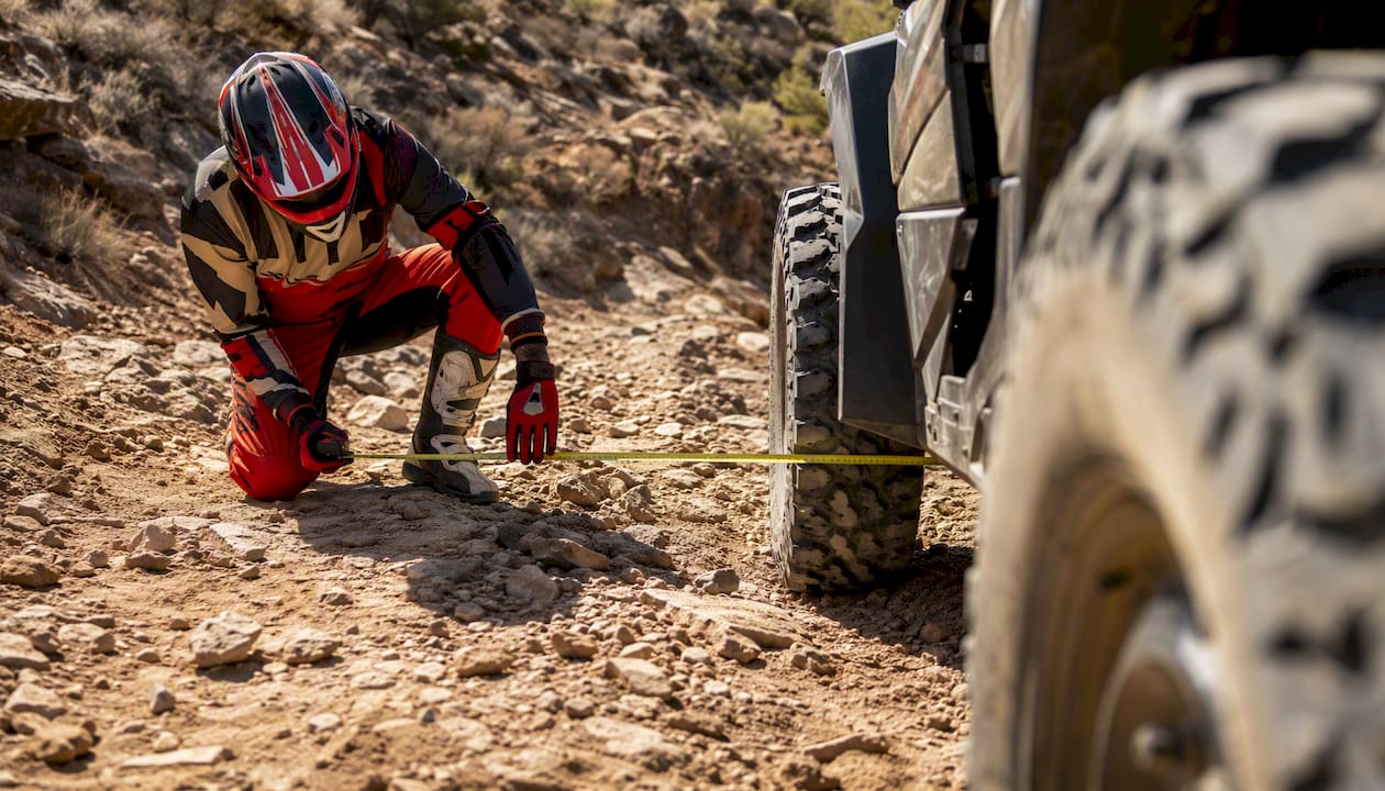 Measuring trail width beside side-by-side vehicle
