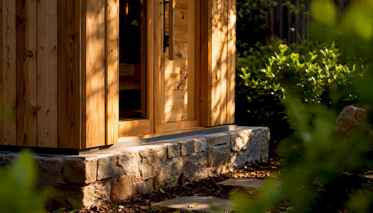 Outdoor sauna on gravel foundation