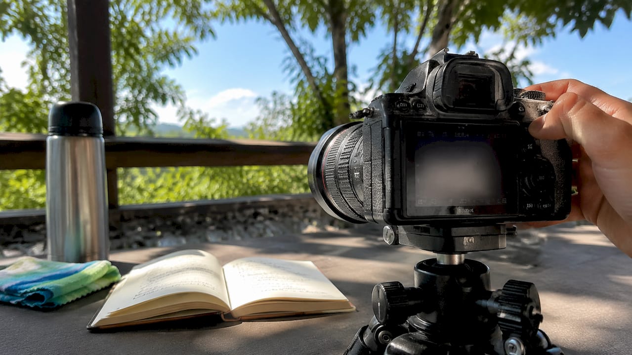 Close-up of DSLR camera settings at WEF event