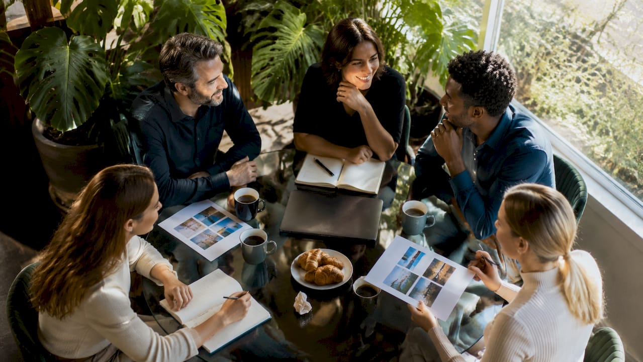 Diverse team in casual corporate meeting room
