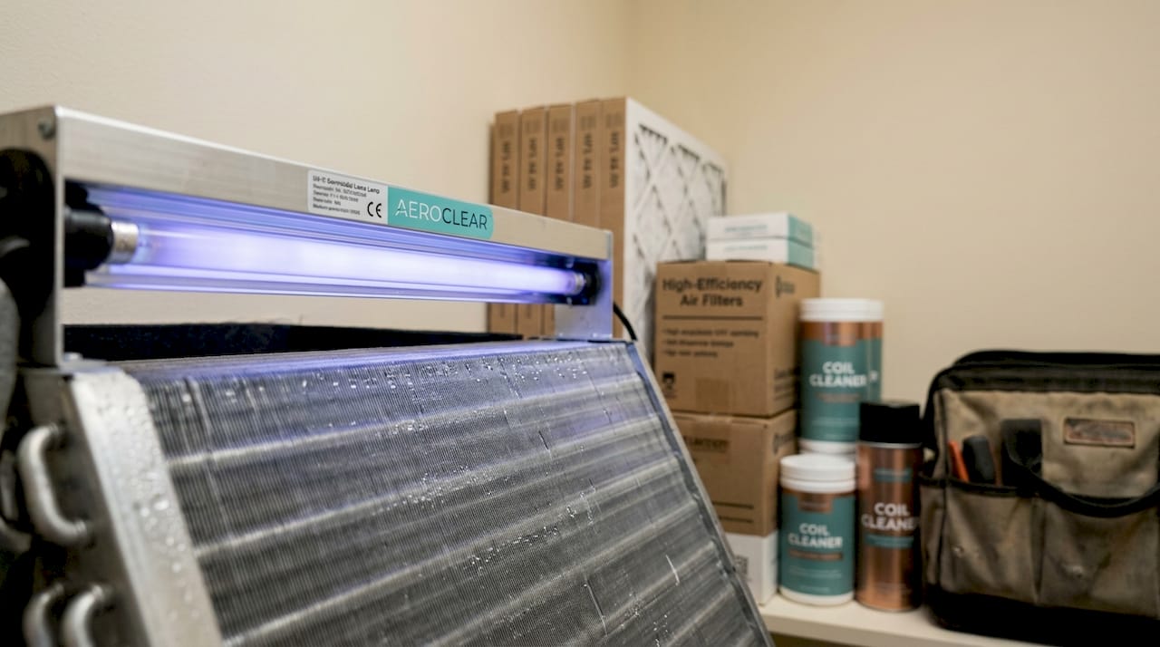 UV-C lamp installed above HVAC evaporator coil