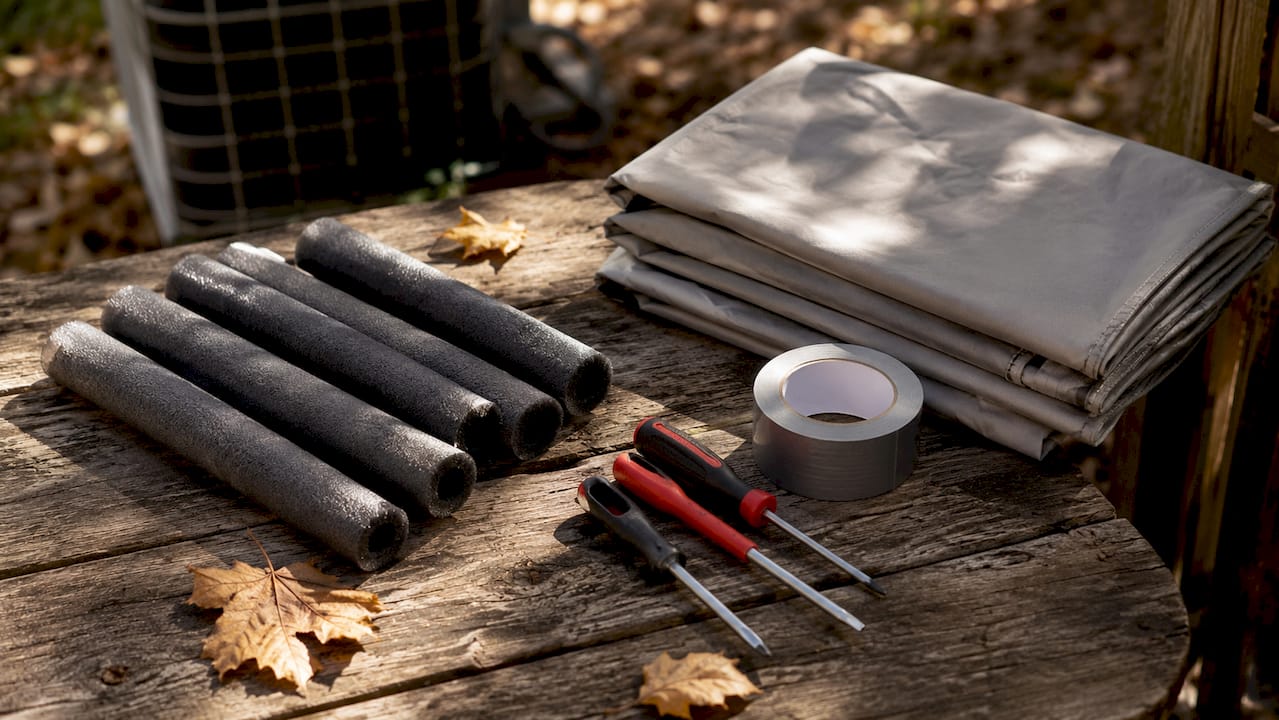 Tools and materials laid out to winterize AC