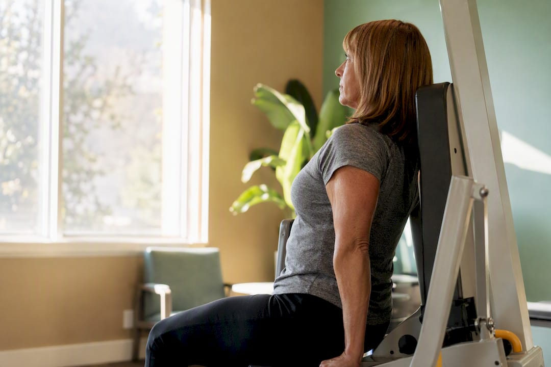 Person doing isometric osteogenic loading exercise