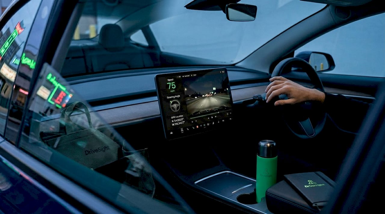 Tesla dashboard showing dashcam overlay data