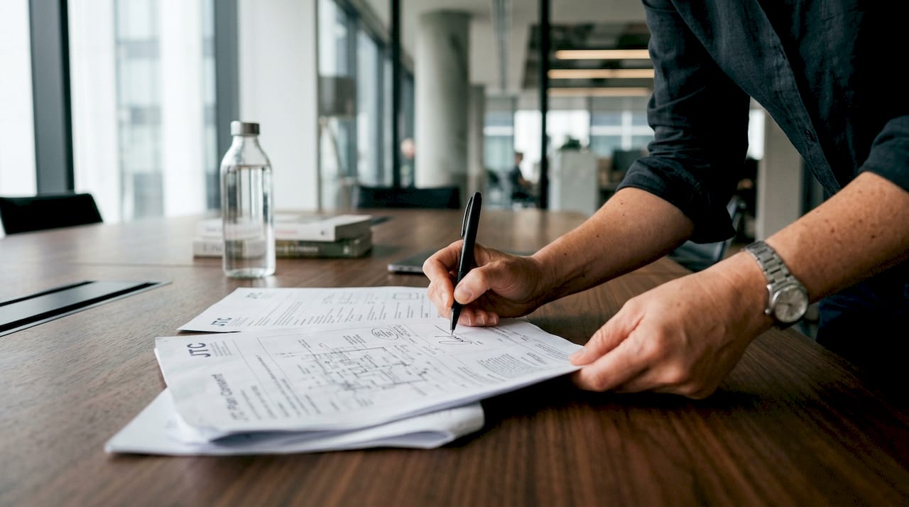 Architect signing JTC submission plan documents