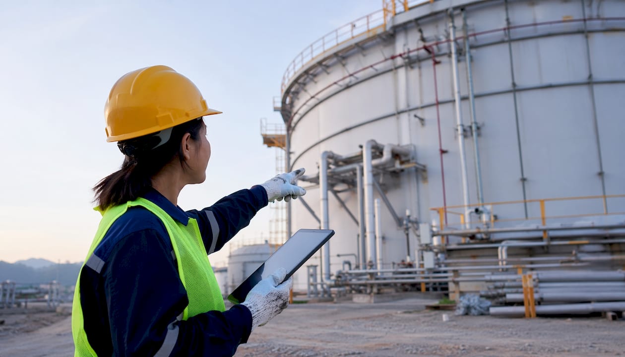 Engineer inspecting industrial building utilities onsite