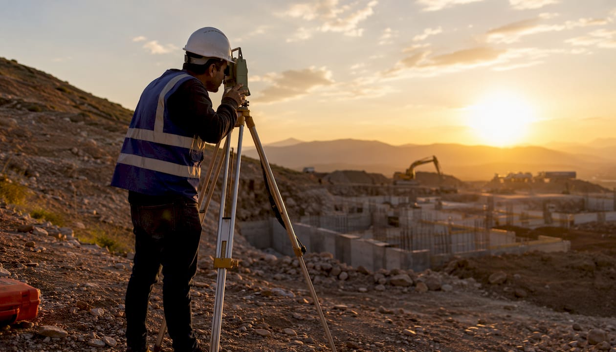 Engineer conducting site survey outdoors