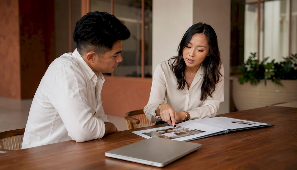 Agents discussing real estate brokerage options