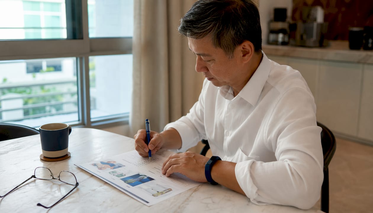 Overhead view of patient reviewing lifestyle plan at home