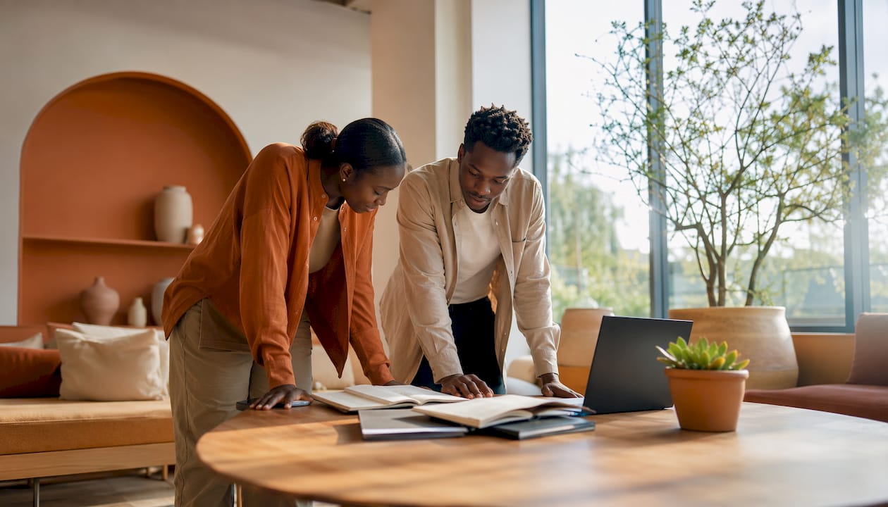Two agents discussing property cooling market
