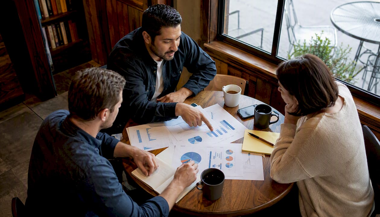 Compliance team discussing risk mapping
