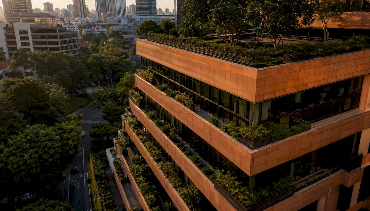 Singapore office building exterior at sunset