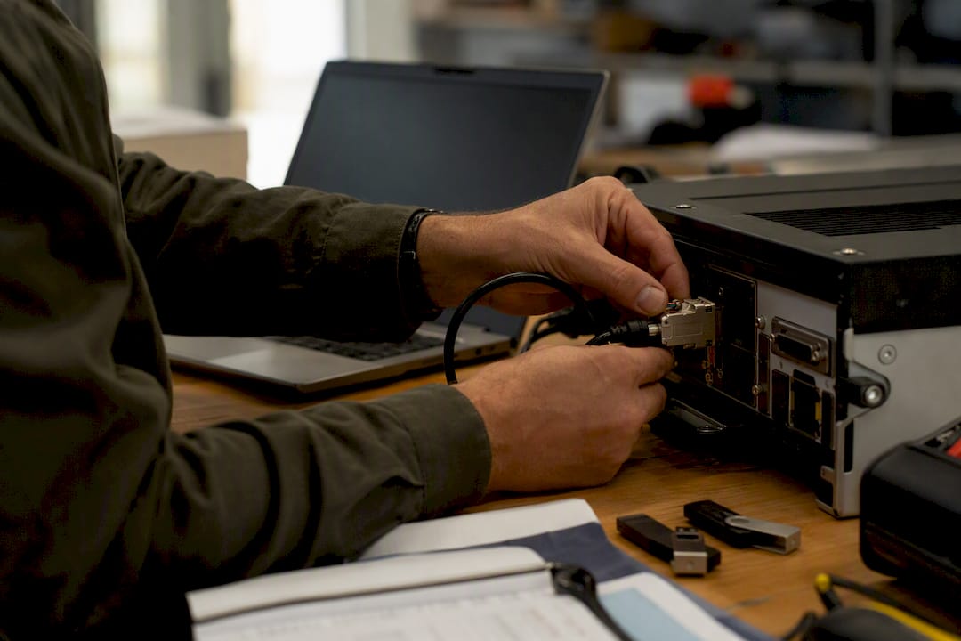Hands adjusting hardware for BIM model export