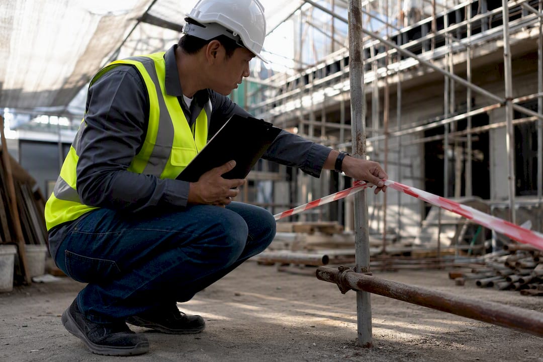 Supervisor inspecting active permit work site