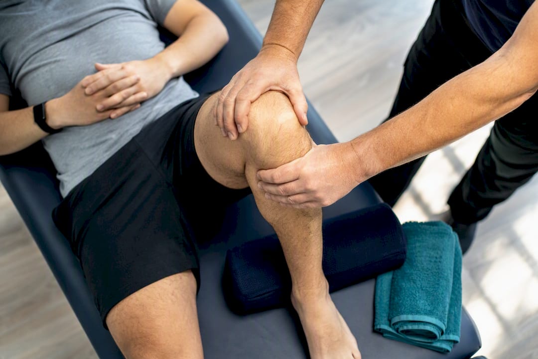 Patient performing resisted Muscle Energy Technique
