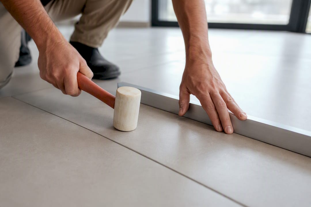 Checking alignment of condo floor tiles