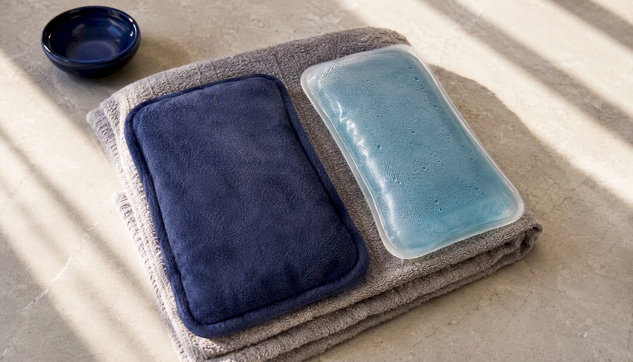 Heat and cold therapy packs on towel