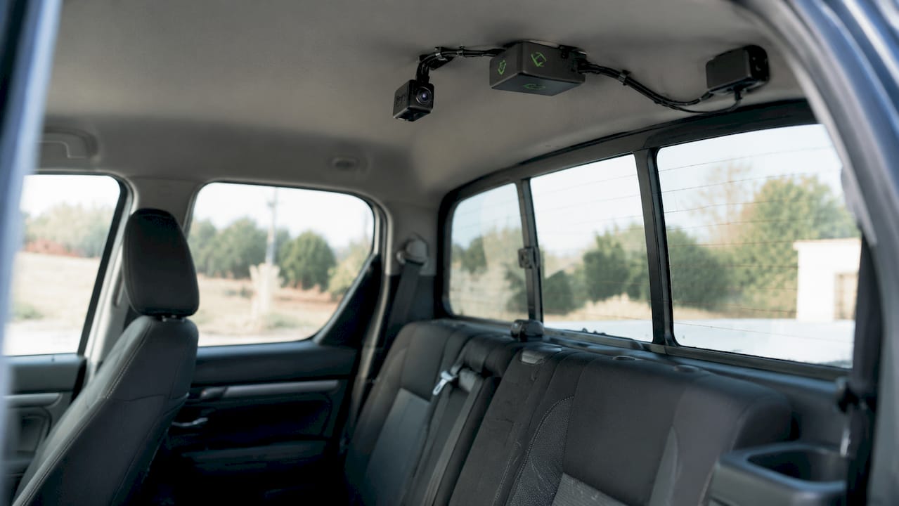 Telematics devices installed inside fleet vehicle cabin