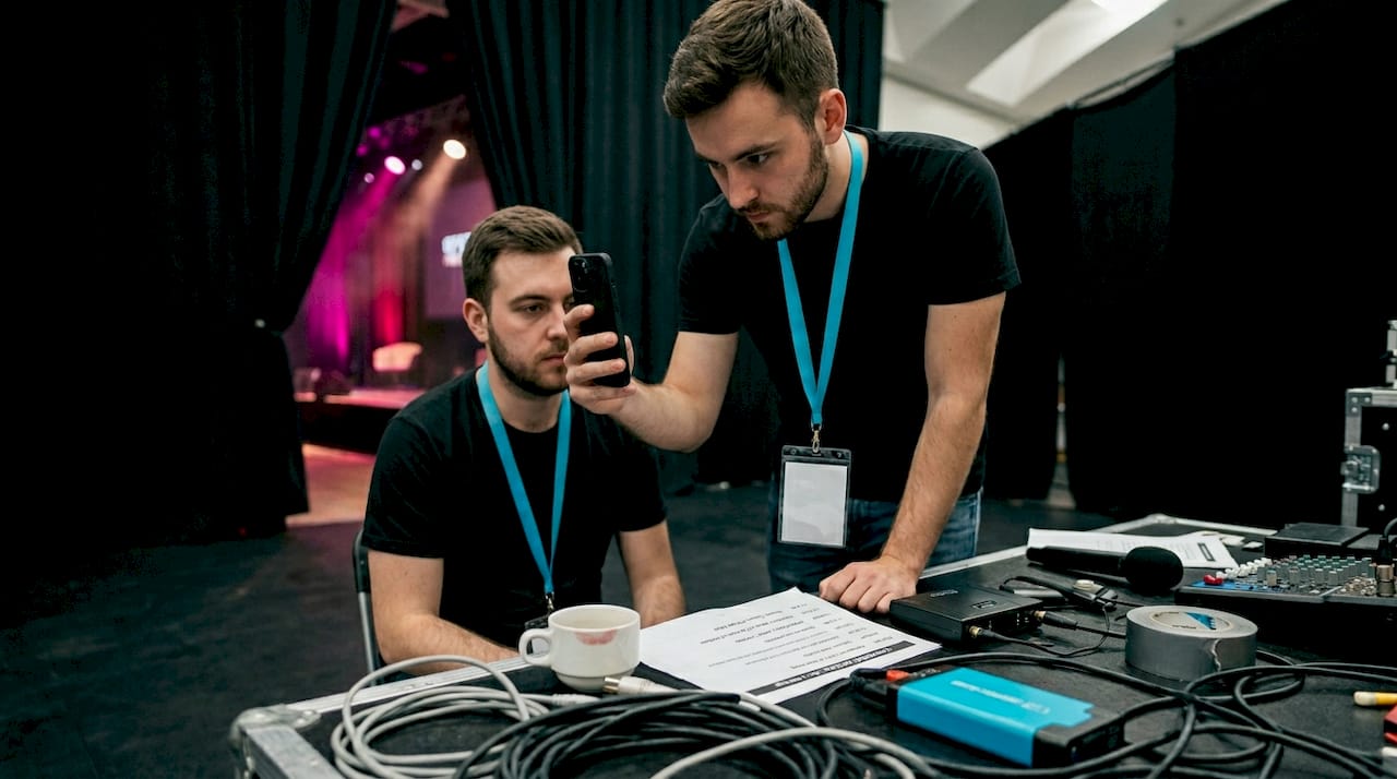 Top social media video types to boost event engagement 1 Staffer filming vertical event video backstage