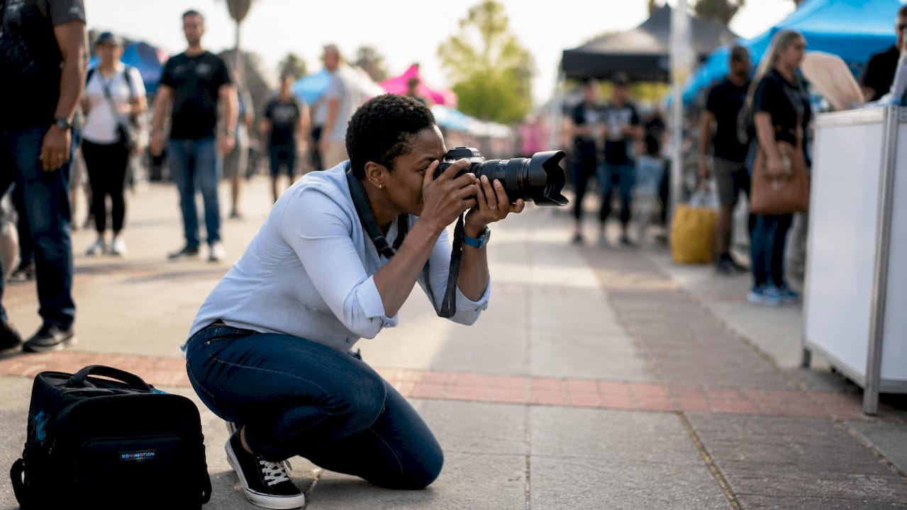 Photographer capturing trade show booth images