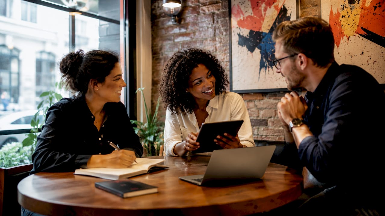 Team collaborating on brand storytelling strategy in office