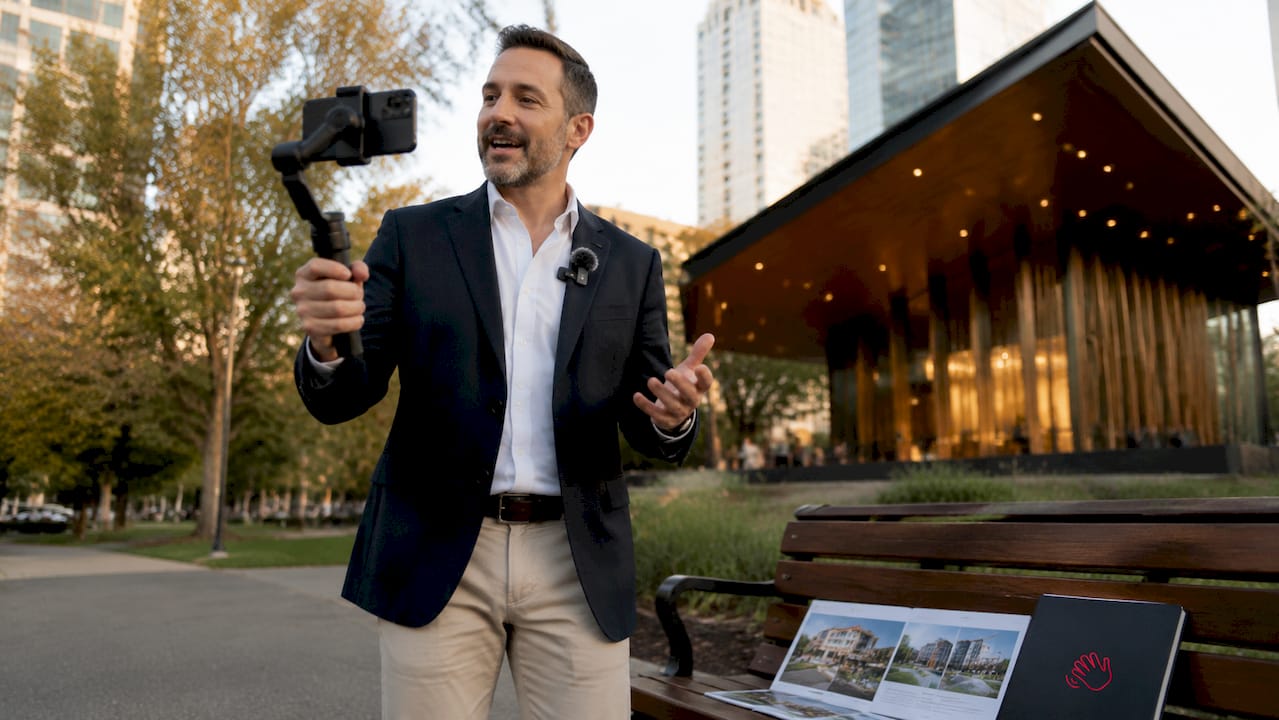 Real estate agent filming property listing video