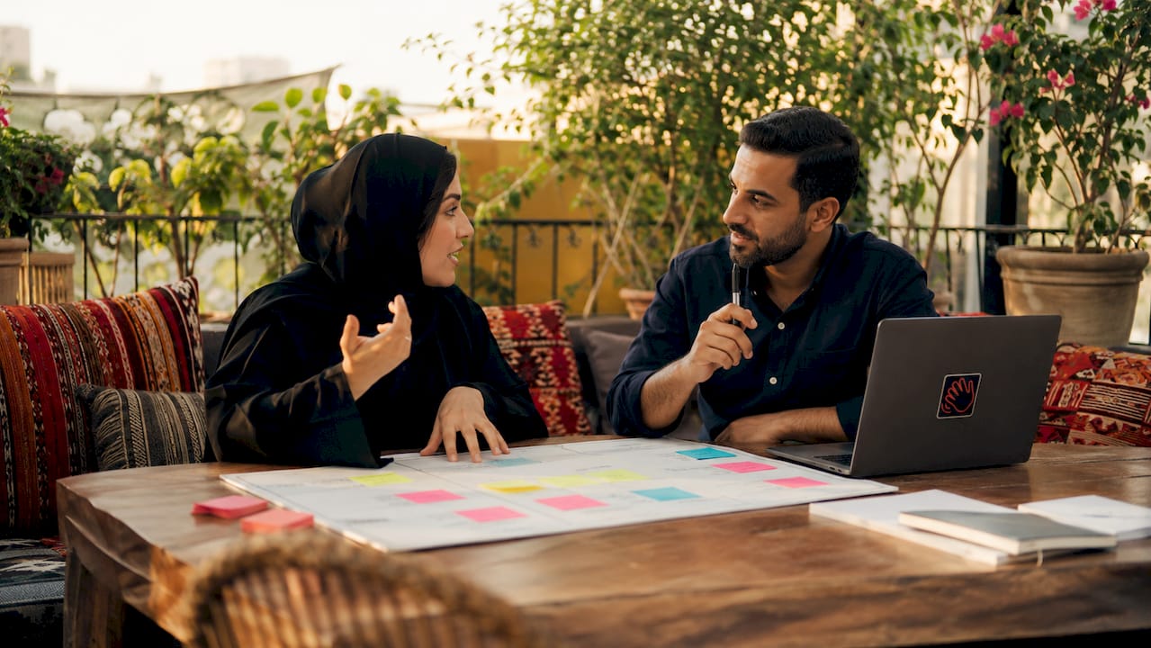 Business partners discussing brand positioning