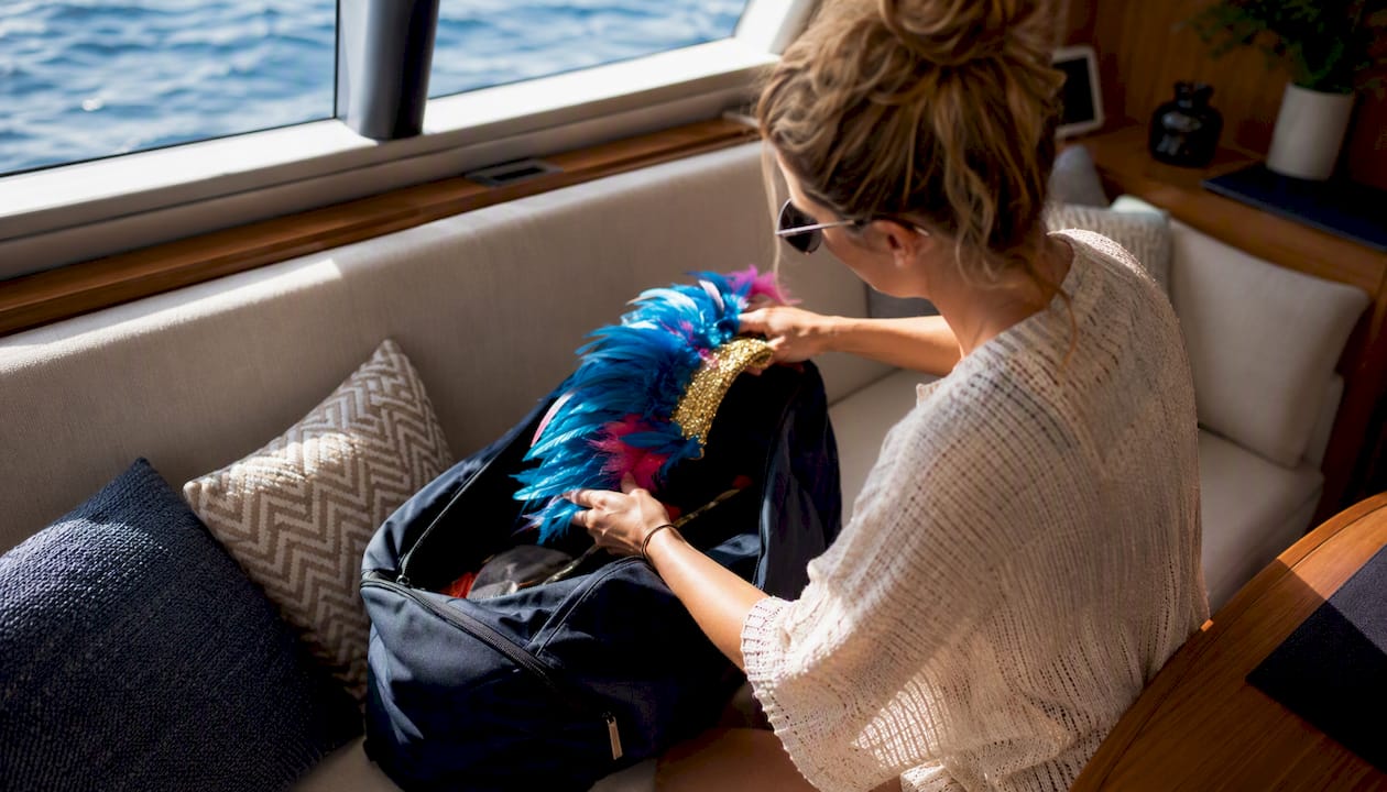 Packing costume accessory in yacht cabin