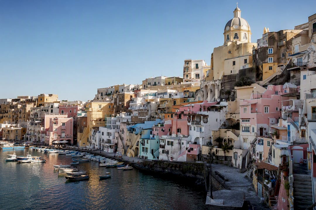 Historic pastel houses above Procida harbor
