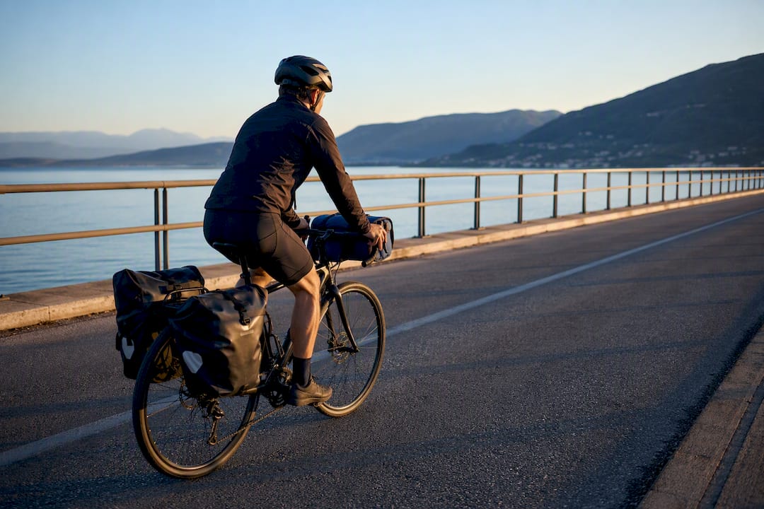 Cyclist crossing the Lefkada access bridge