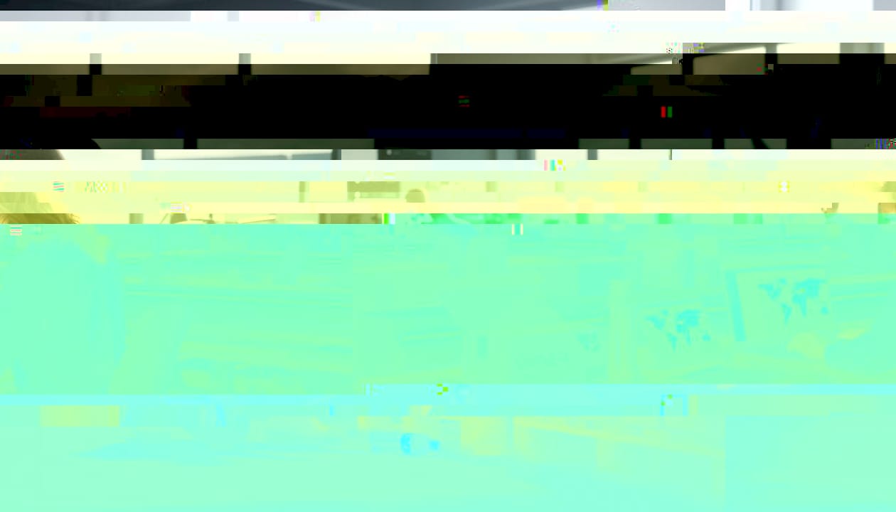 Warehouse supervisor checks AI-powered reports