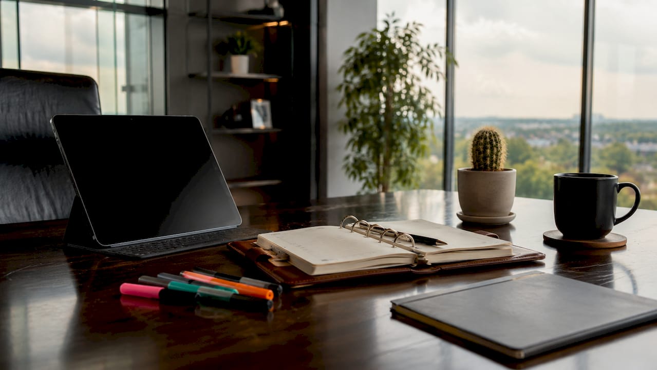 Overhead view of CEO's organized time management desk