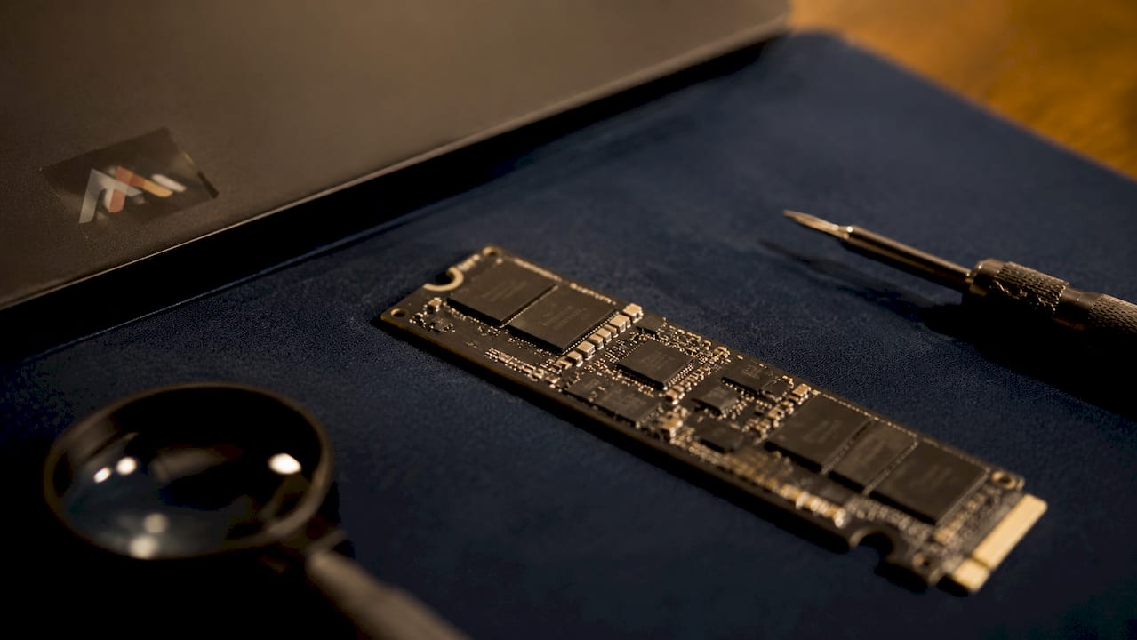 Mac SSD module with tools on anti-static mat