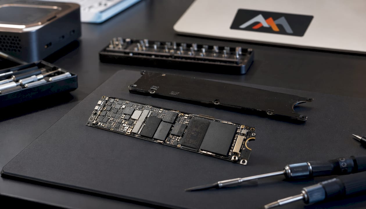 Close-up of MacBook SSD on wooden table