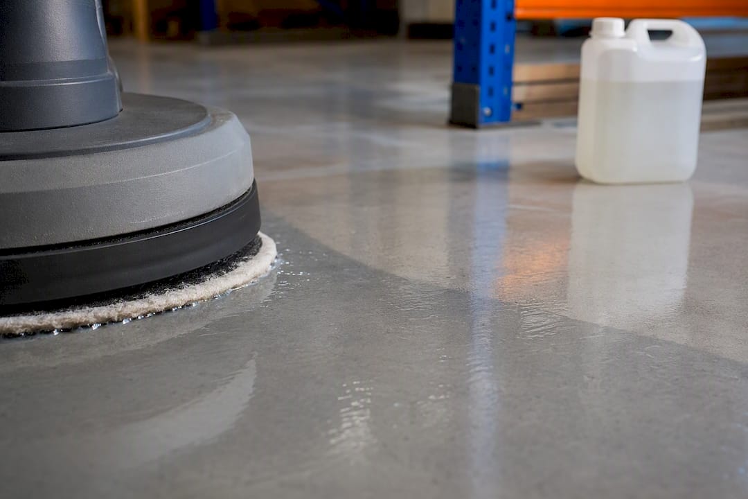 Soft pad cleaning an epoxy warehouse floor
